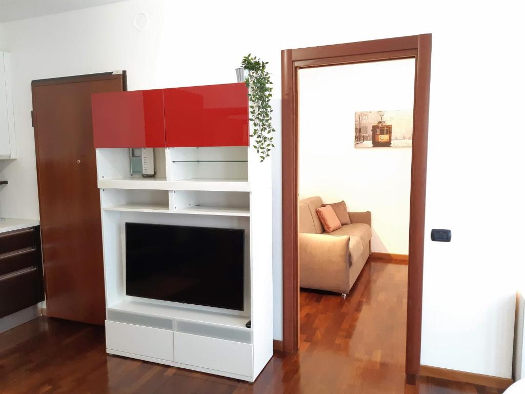 Telewizja i/lub zestaw kina domowego w obiekcie Suite Rent Milan