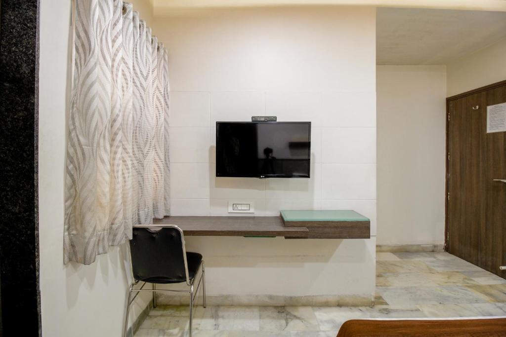 TV a/nebo společenská místnost v ubytování Hotel City Inn