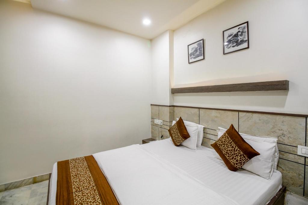 Postel nebo postele na pokoji v ubytování Hotel City Inn