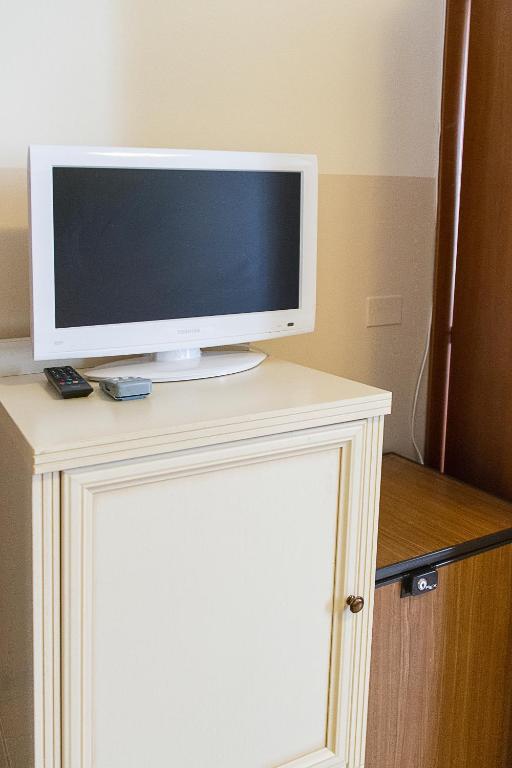 TV a/nebo společenská místnost v ubytování Hotel La Terrazza