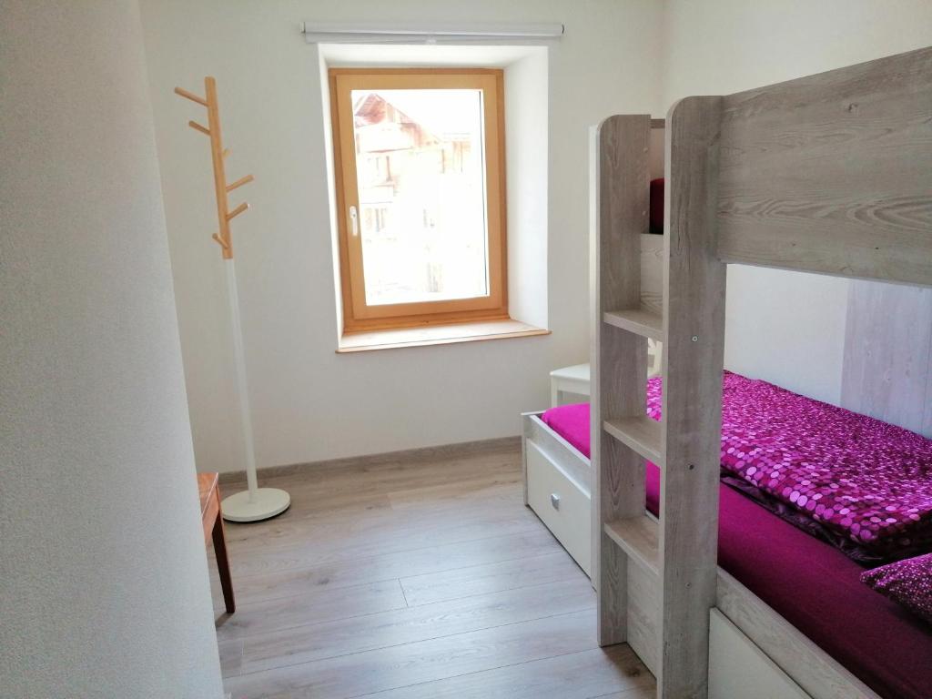 Postel nebo postele na pokoji v ubytování Ferienwohnung PARDI