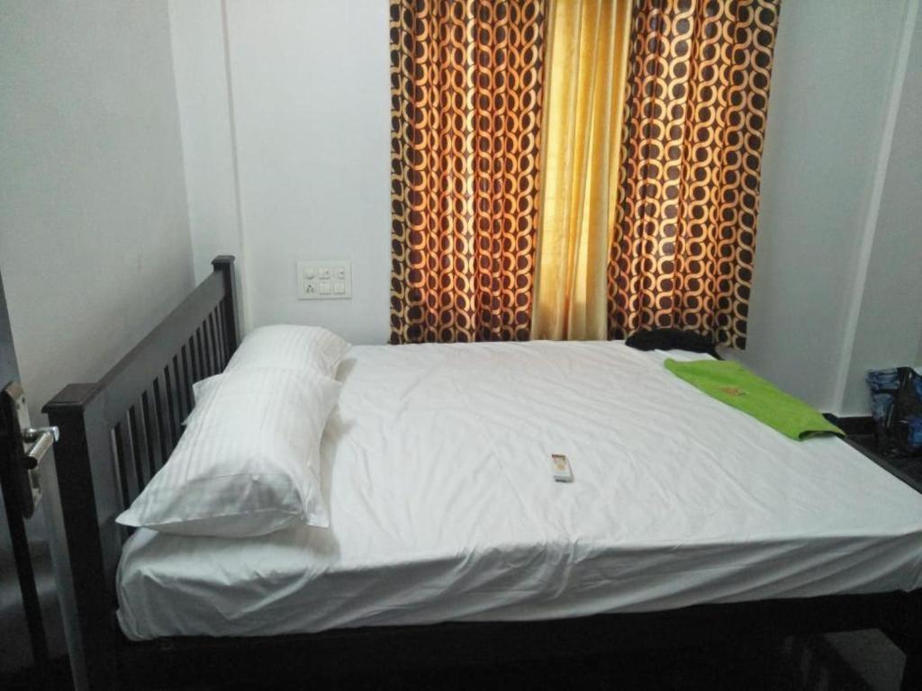 Postel nebo postele na pokoji v ubytování Coral Homes