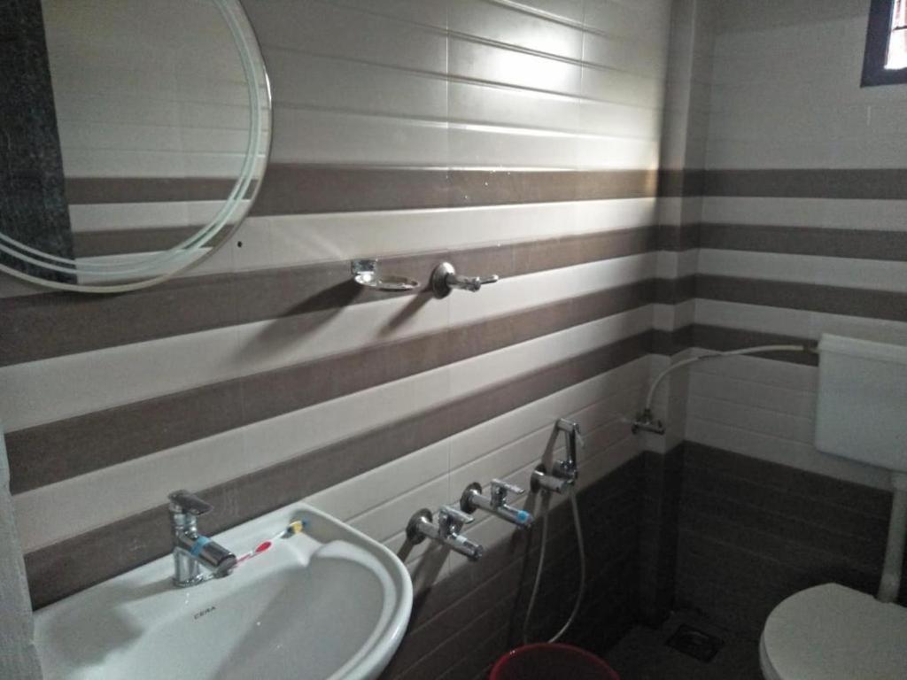 Koupelna v ubytování Coral Homes