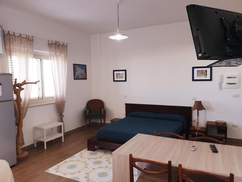 TV a/nebo společenská místnost v ubytování Fronte Mare a Venetico