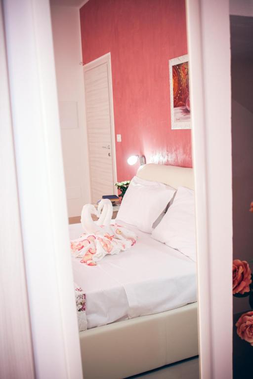 Postel nebo postele na pokoji v ubytování Il Sorriso B&B