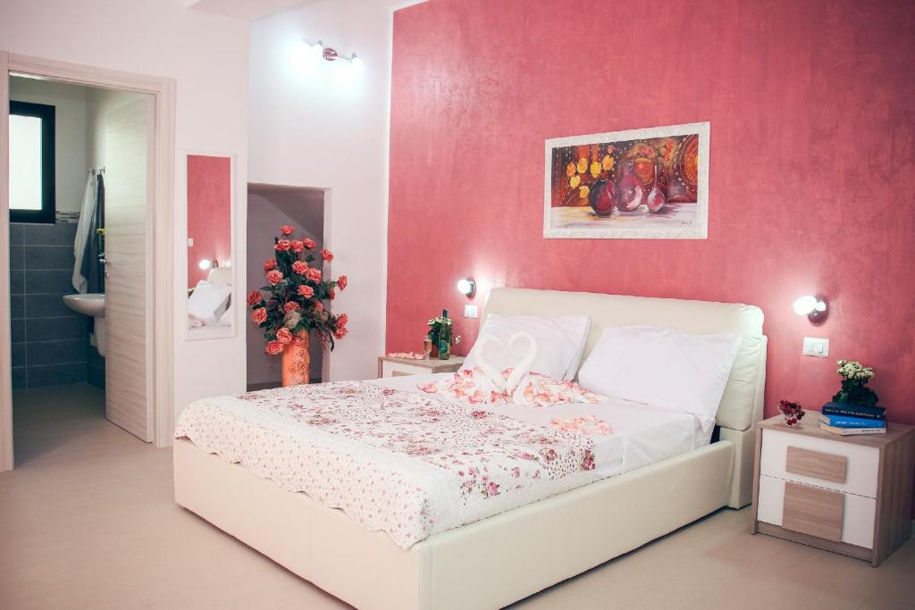 Postel nebo postele na pokoji v ubytování Il Sorriso B&B