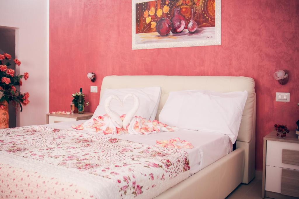 Postel nebo postele na pokoji v ubytování Il Sorriso B&B