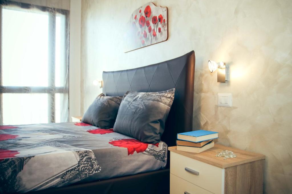 Postel nebo postele na pokoji v ubytování Il Sorriso B&B