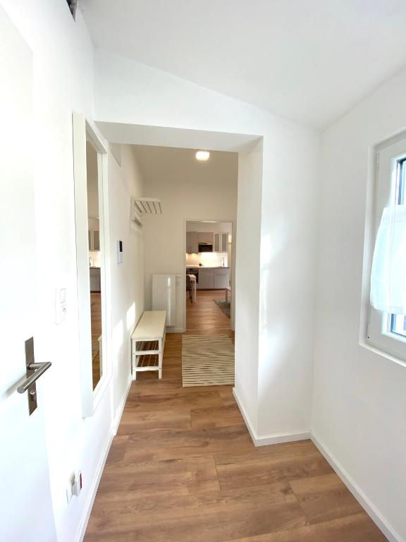 Posteľ alebo postele v izbe v ubytovaní White Inn - Ferienwohnung mit Terrasse