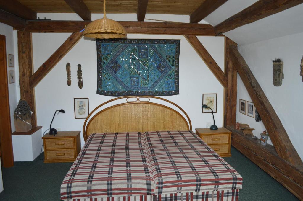 Postel nebo postele na pokoji v ubytování Penzion Medvedi Paseka