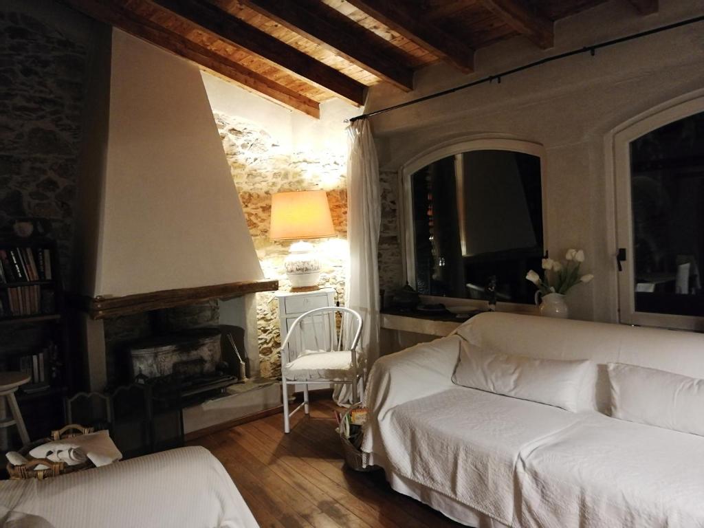 Giường trong phòng chung tại Casale Maria Mafalda
