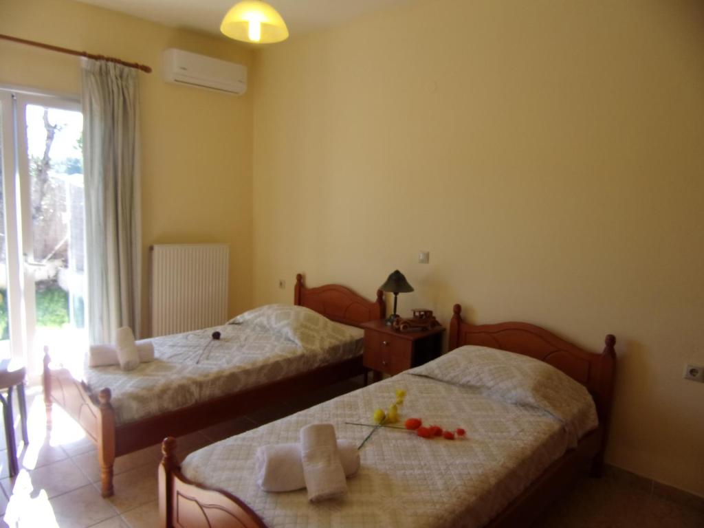 Postel nebo postele na pokoji v ubytování George's Apartment