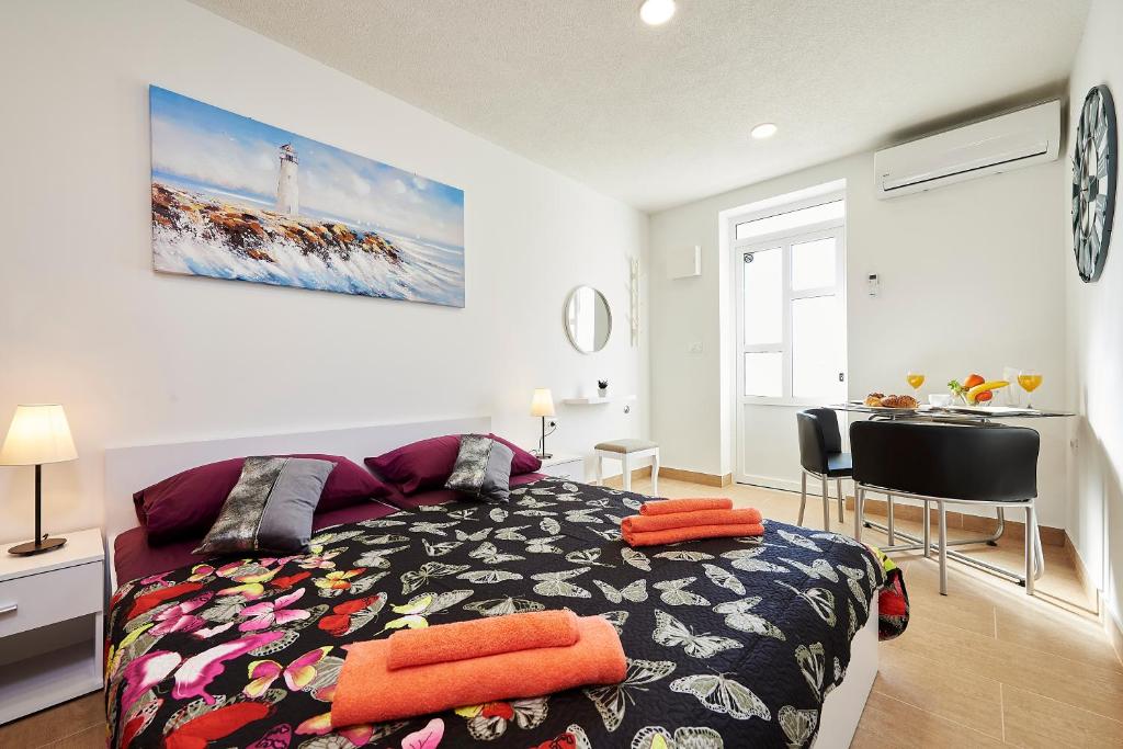 Posteľ alebo postele v izbe v ubytovaní Studio apartment Bašćan