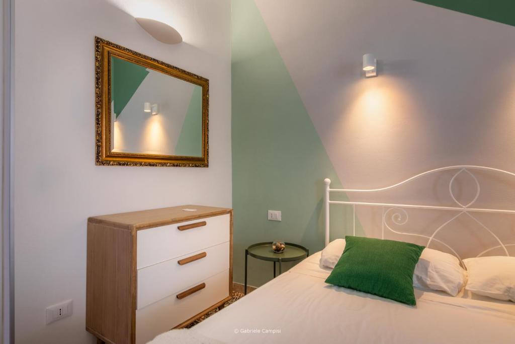 Postel nebo postele na pokoji v ubytování Bella Vista Rooms