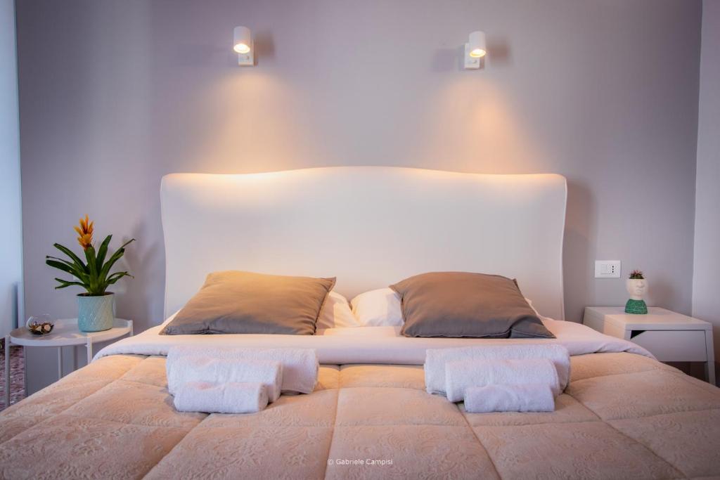 Postel nebo postele na pokoji v ubytování Bella Vista Rooms