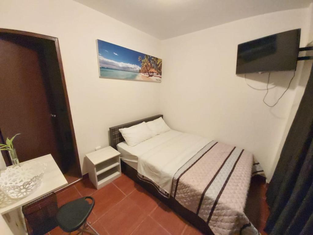 Cama o camas de una habitación en HOSPEDAJE LA CASITA