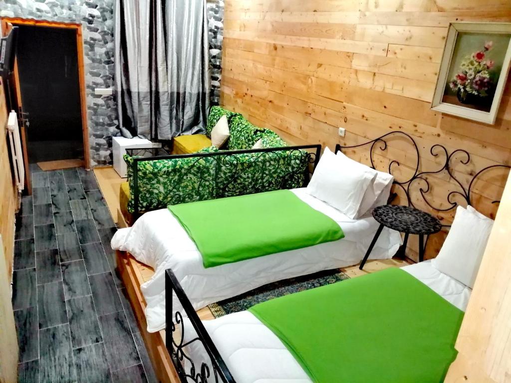 Postel nebo postele na pokoji v ubytování Tamanoucht