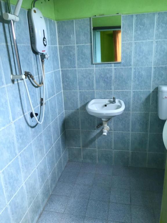 Koupelna v ubytování Hotel Cahaya