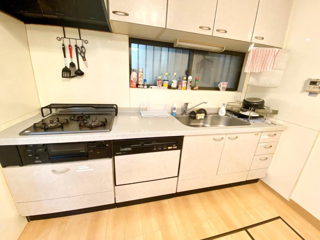 Kuchyň nebo kuchyňský kout v ubytování Upper Hotel Ryogoku