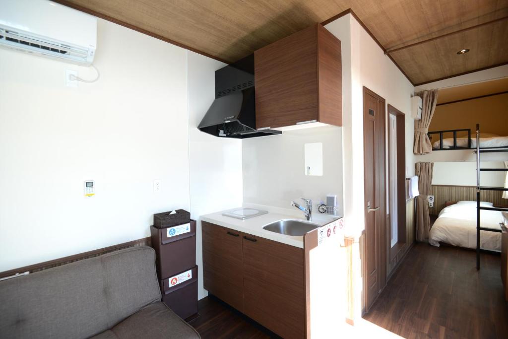 Postel nebo postele na pokoji v ubytování Mt Fuji Glamping TOURIST VILLA Kawaguchiko