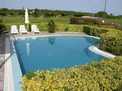 Bazén v ubytování Antonios Village Hotel & Apartments nebo v jeho okolí