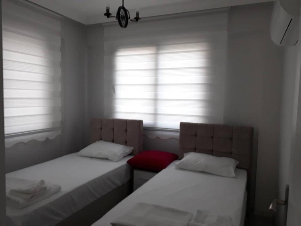 A bed or beds in a room at Private Villa in Gocek Villa Perest