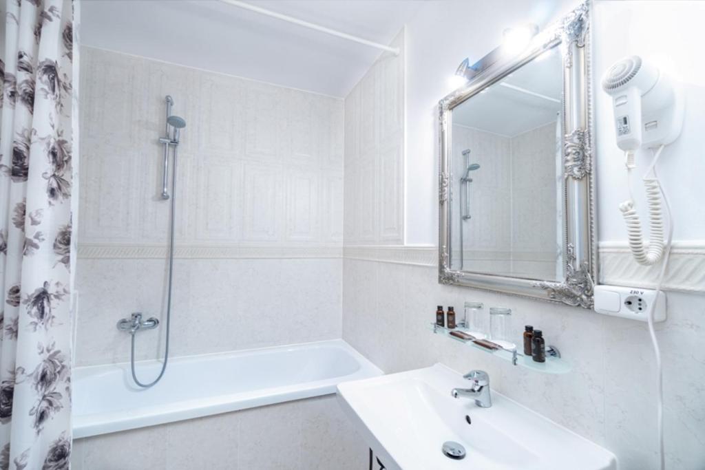 Koupelna v ubytování Forums Boutique Hotel