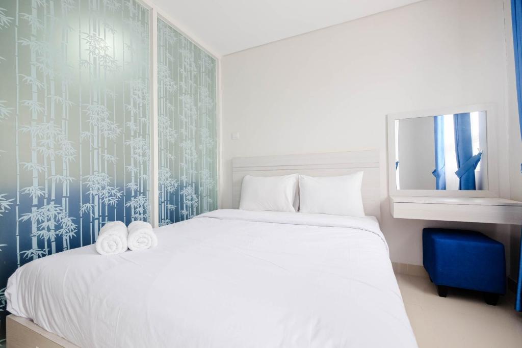 Postel nebo postele na pokoji v ubytování Cozy and Modern 1BR Apartment at Atlanta Residences By Travelio