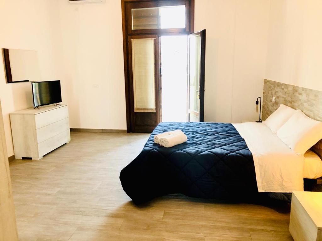 Postel nebo postele na pokoji v ubytování B&B Villa Ermanna