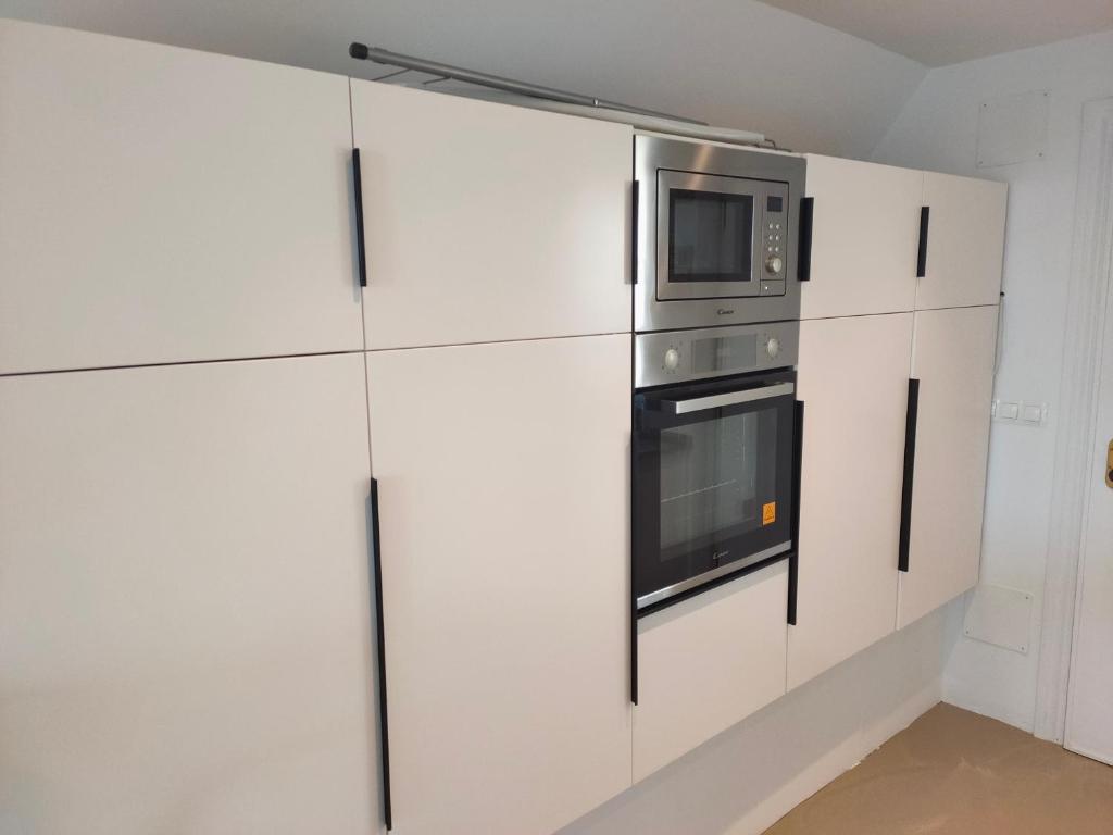 Kuchyň nebo kuchyňský kout v ubytování HEXAGON Apartment BY NAMASTE ELITE