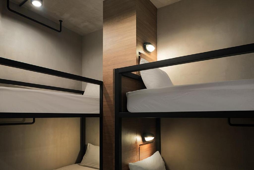 Postel nebo postele na pokoji v ubytování Tido Hostel Penang