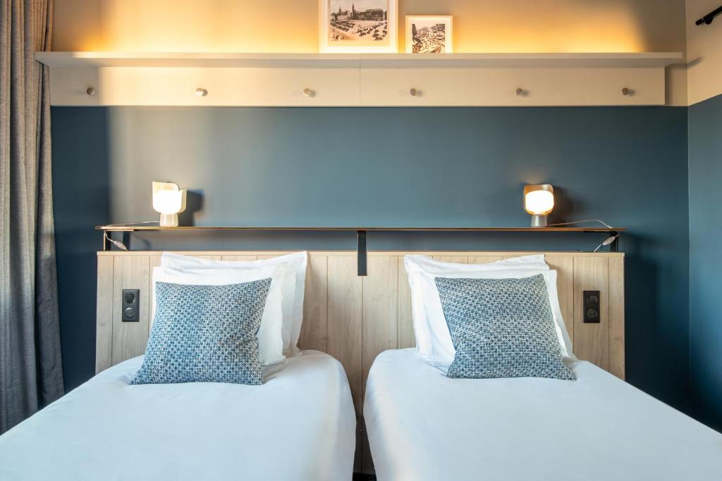 Postel nebo postele na pokoji v ubytování Hotel Kaijoo by HappyCulture