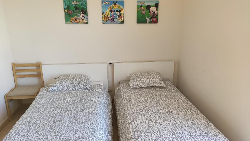 Postel nebo postele na pokoji v ubytování 62, Amuley Mar 2