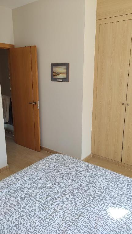 Postel nebo postele na pokoji v ubytování 62, Amuley Mar 2
