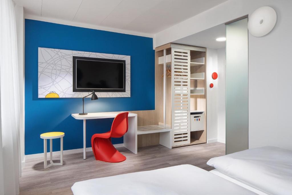 TV a/nebo společenská místnost v ubytování Comfort Hotel Prague City