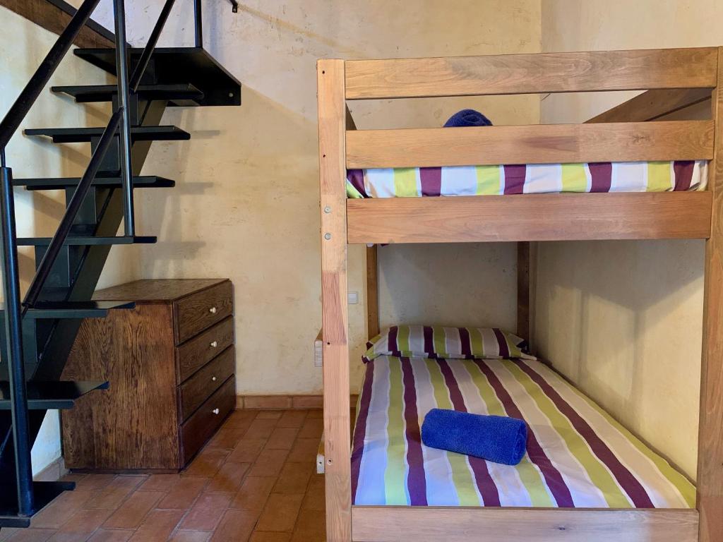 Postel nebo postele na pokoji v ubytování Can Vila