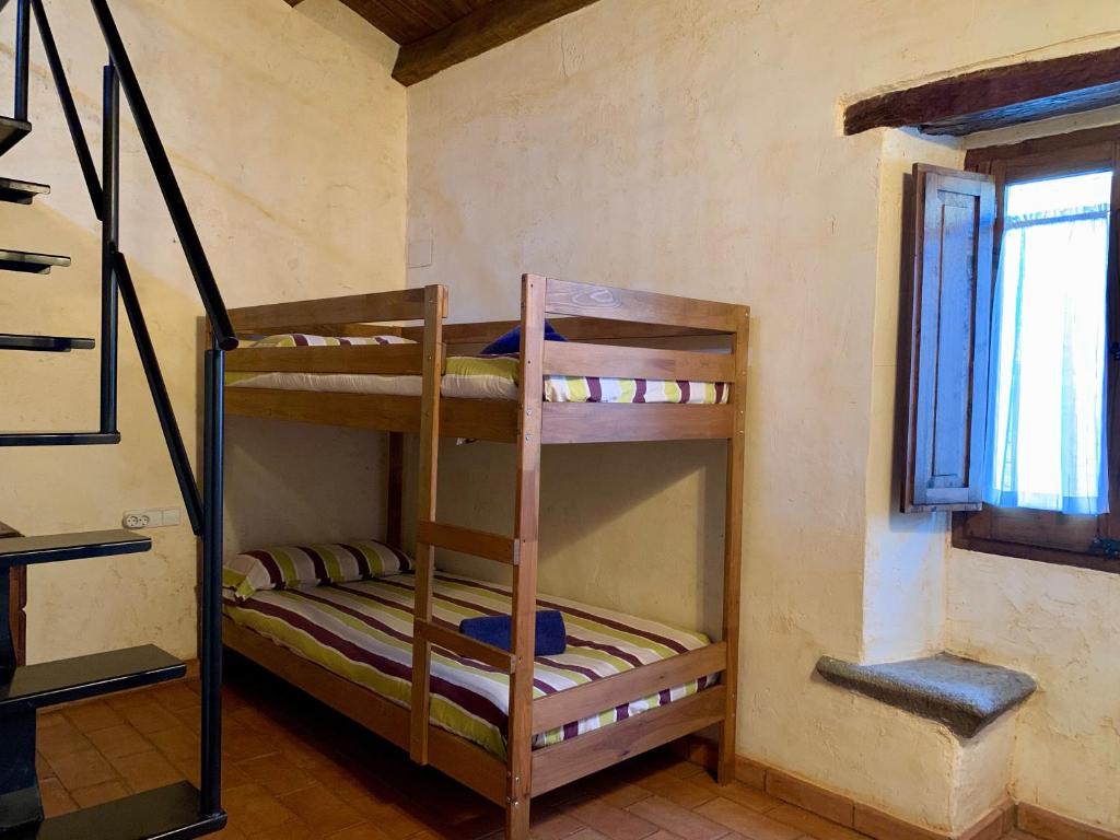 Postel nebo postele na pokoji v ubytování Can Vila