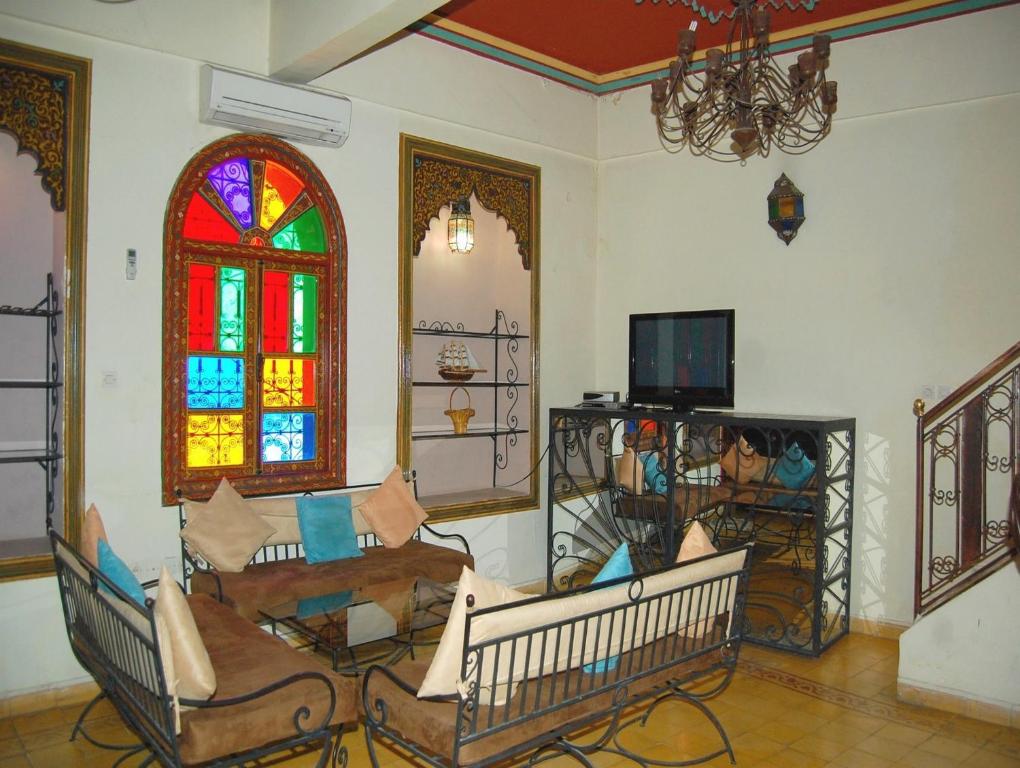 TV a/nebo společenská místnost v ubytování Résidence Miramare Marrakech