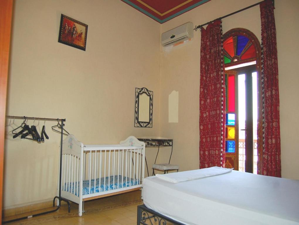 Postel nebo postele na pokoji v ubytování Résidence Miramare Marrakech