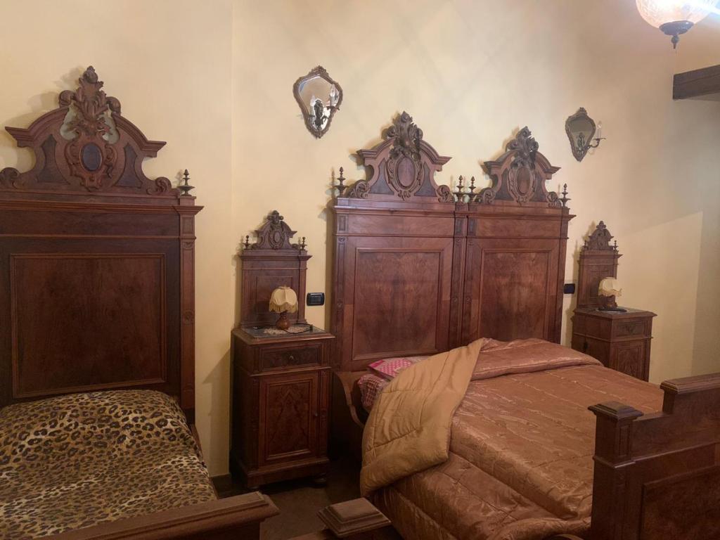 Łóżko lub łóżka w pokoju w obiekcie B&B Dal Fiocinino