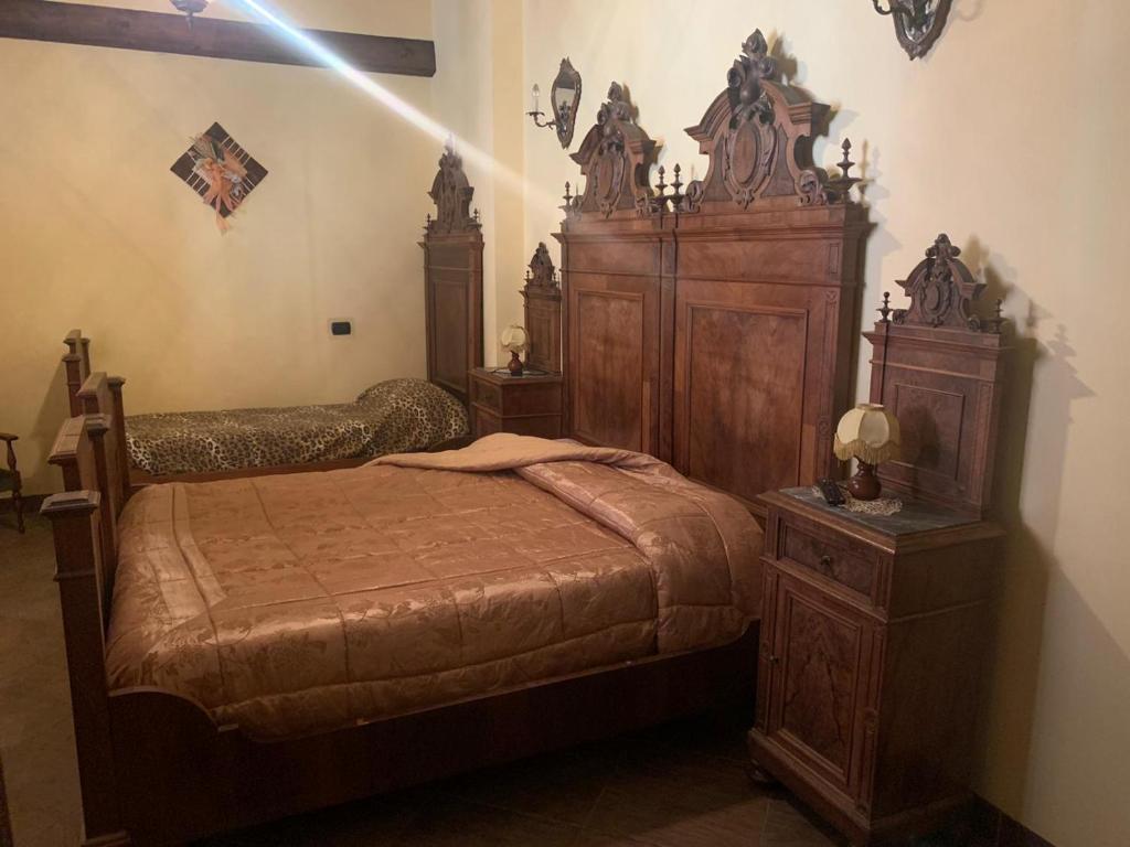 Łóżko lub łóżka w pokoju w obiekcie B&B Dal Fiocinino