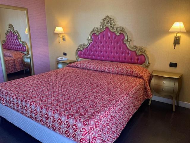 Postel nebo postele na pokoji v ubytování Hotel - Motel Flower