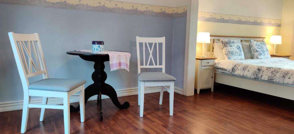 Postel nebo postele na pokoji v ubytování Bolmsö B&B