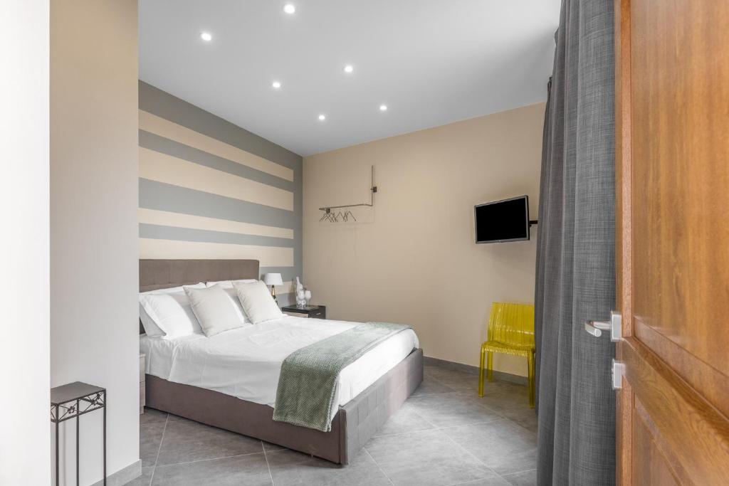 Postel nebo postele na pokoji v ubytování VIVERONE LAKE ROOMS