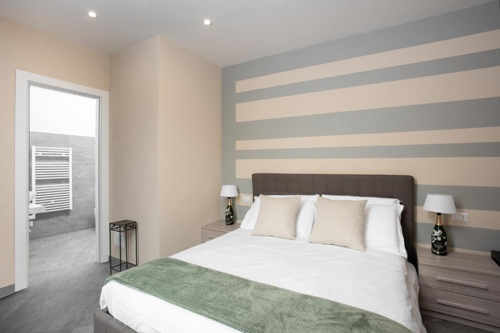 Postel nebo postele na pokoji v ubytování VIVERONE LAKE ROOMS