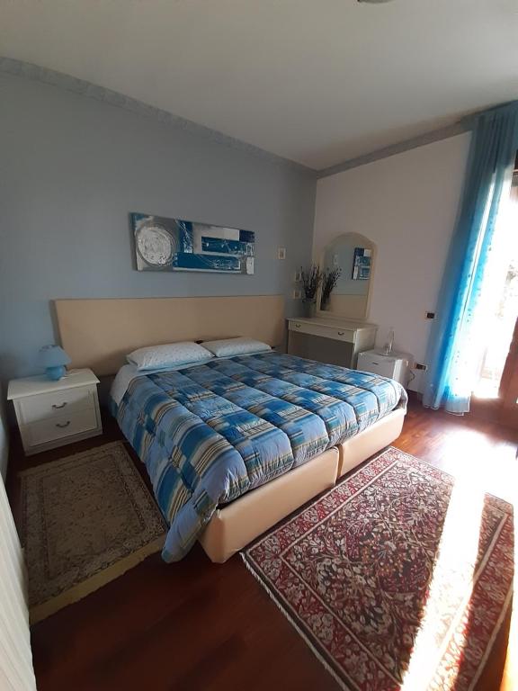 Postel nebo postele na pokoji v ubytování Le 3 Camelie Malpensa