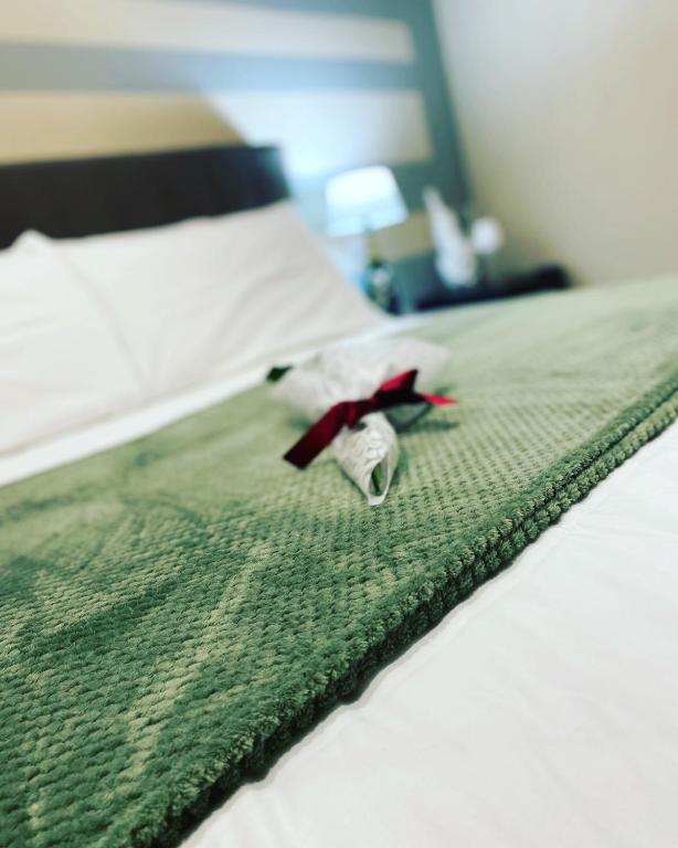 Postel nebo postele na pokoji v ubytování VIVERONE LAKE ROOMS