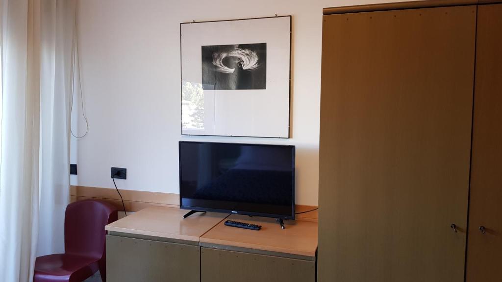 TV a/nebo společenská místnost v ubytování Addaura Village e Congressi