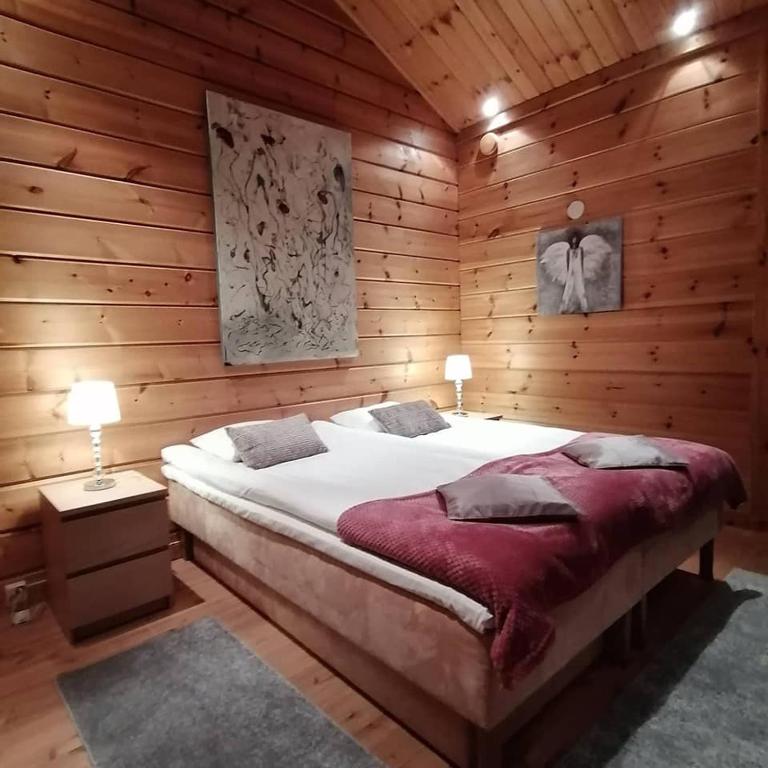 Postel nebo postele na pokoji v ubytování Santa's Little Village - Hotel Uitonniemi