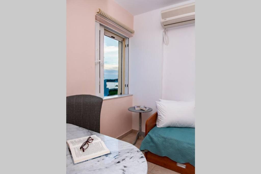 Fotografia z galérie ubytovania Manos Seaside Apartment v destinácii Makry Gialos